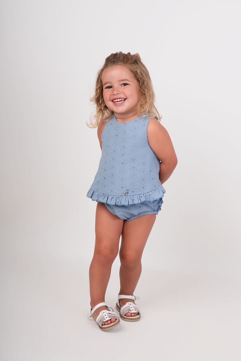 Conjunto bebé azul bordado con volante de Nekenia